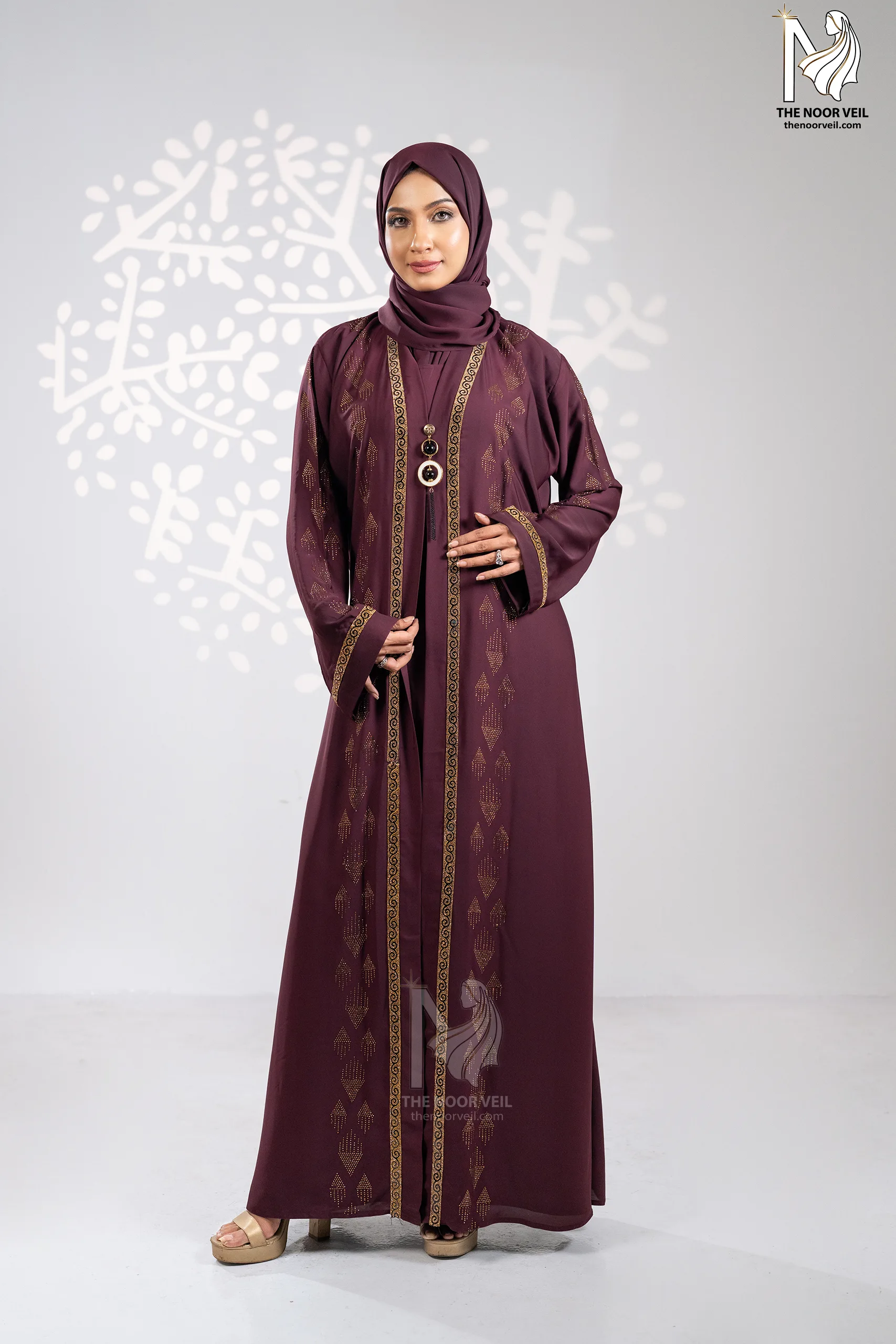 Full body view of the Kyra abaya deep maroon