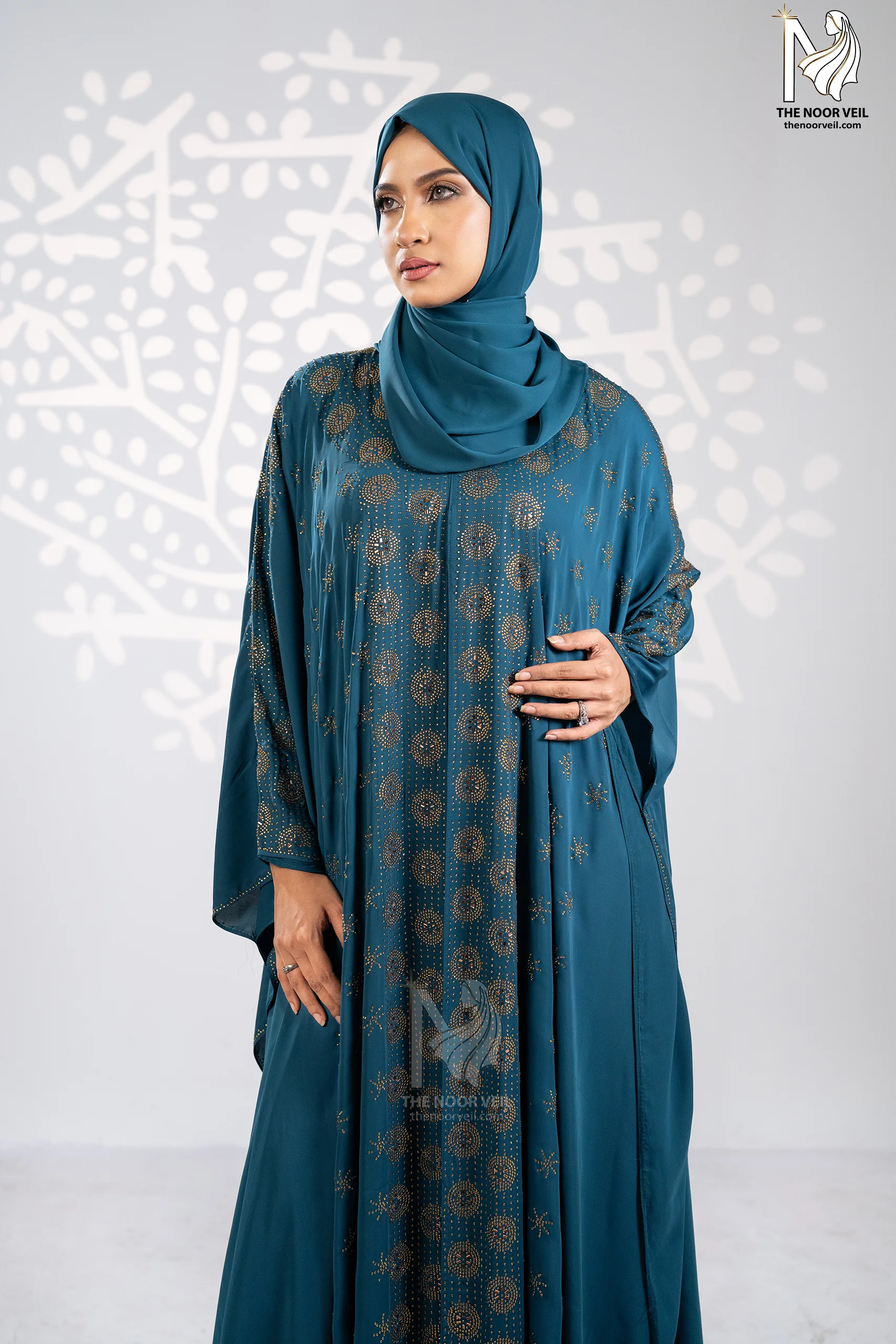 Full body view of the Sultana Abaya Tore